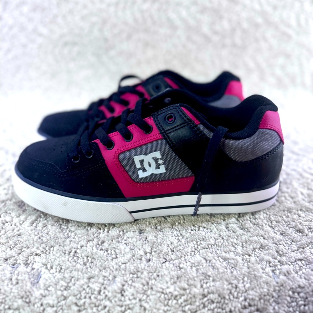 Practically brand new. DC skate board shoes, very cool style
